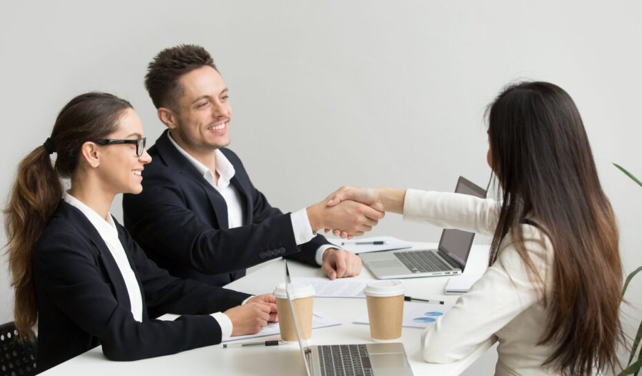 friendly-partners-handshaking-group-meeting-thanking-successful-teamwork-scaled.jpg
