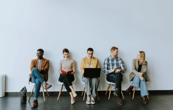 group-bored-young-people-waiting-job-interview